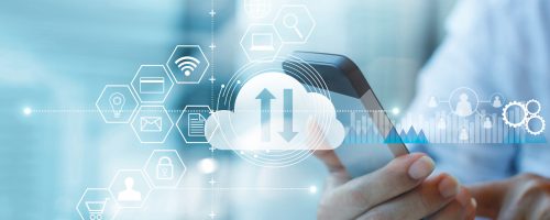 Businessman using a smartphone connected to cloud services